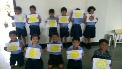 All the children from Grade - JKG to V participated in it. They were given different pictures and the children pasted glaze paper in it, and they enjoyed the activity.